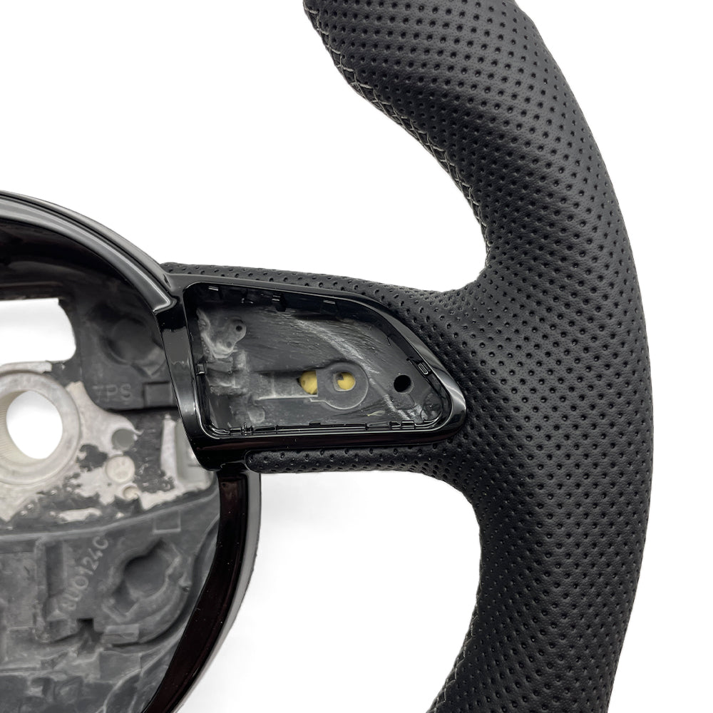 Carbon fiber semi perforated leather multifunctional steering wheel, flat bottomed sports steering wheel, suitable for Audi A4 B8 Q3 A3 8V