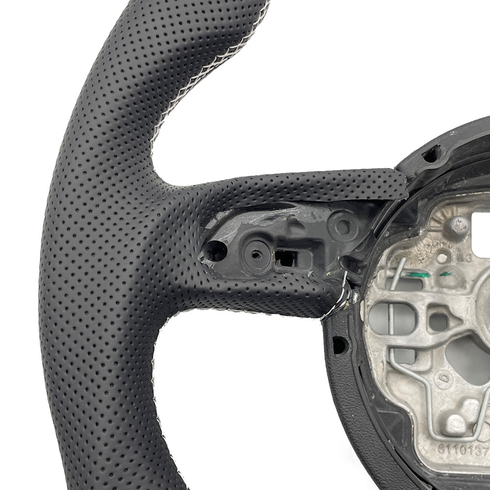 Carbon fiber perforated leather multifunctional steering wheel with white return logo, suitable for Audi A6 C7