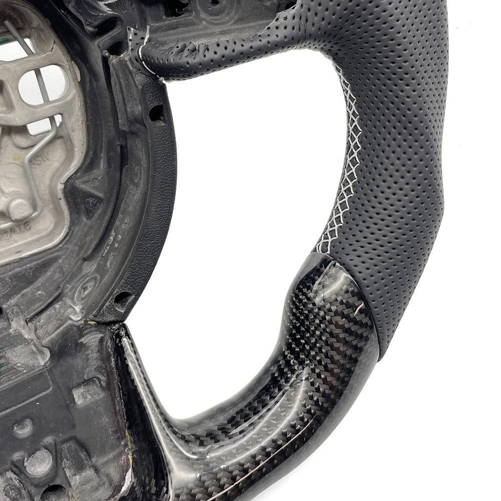 Carbon fiber perforated leather multifunctional steering wheel with white return logo, suitable for Audi A6 C7